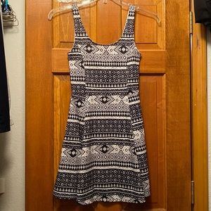 Black and white patterned skater dress
